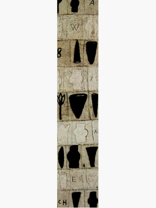 A narrow vertical strip of patterned wallpaper or fabric featuring a beige background with black and off-white botanical motifs, letters, and small decorative elements.